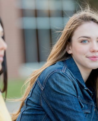 Teenage girl outdoors on school campus